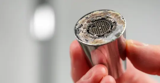 Faucet aerator with lime scale build up